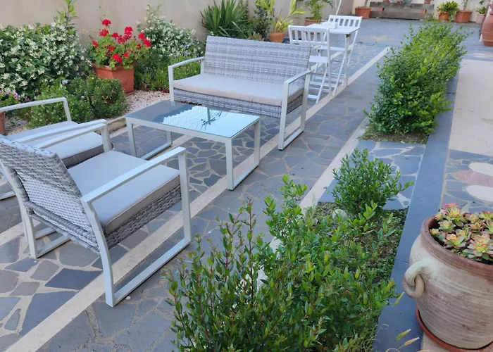 Nyaraló Guspini-casa Vacanze Con Giardino Iun R1321